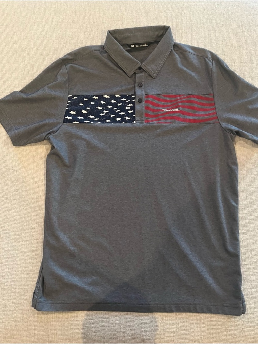 Men's Travis Matthew’s Polo Shirt with Flag Chest Panel